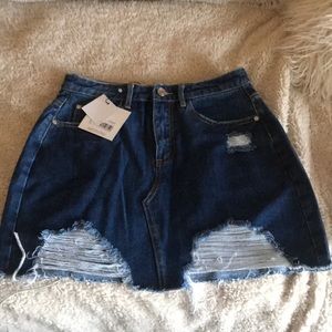 Ripped denim skirt